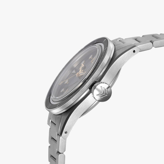 A close-up side profile of the Lorier Neptune diver's watch. It has a stainless steel case and three-link bracelet, a black dial, and a prominent ridged crown, shown against a light gray background.